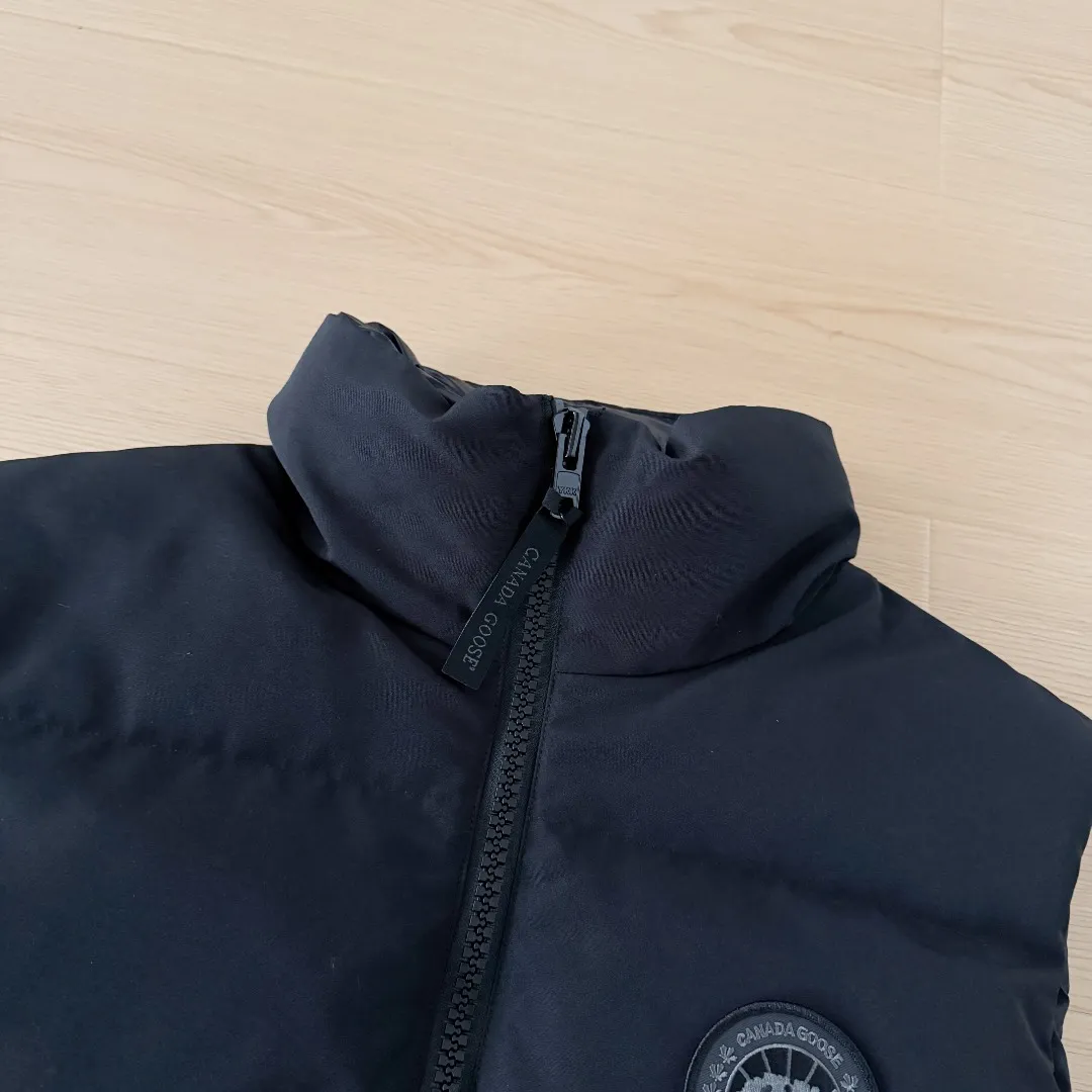 Style number: Y 180 2267WB Grandview black label women's short vest. Constructed from Arctic Tech recycled fabric®, it features a cinchable hem for sleek styling and storage. Color: Pink Black Khaki Light Blue Size: XS S M L XL